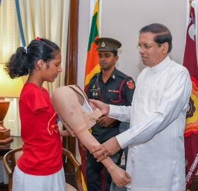 President donated an artificial limb to a student