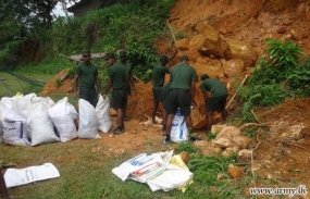 Army troops protect school from mudslides