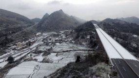 Fifty dead and thousands stranded as cold snap hits East Asia