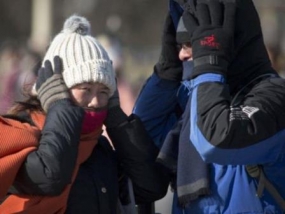 Orange alert as worst cold front in decades hits China