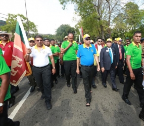 PM joins Lions Club walk