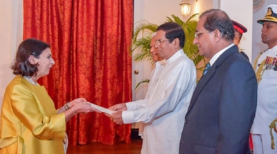 Four new envoys present credentials to President