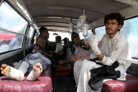 Afghan road crash inferno leaves at least 73 dead