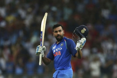 Sharma century guides India to opening World Cup win