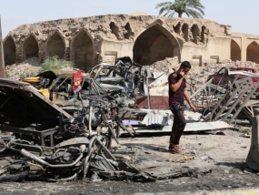 115 killed in suicide attack on market place in Iraq