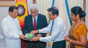 Currency note issued to commemorate Independence anniversary presented to the President