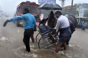Chennai drowns in deluge of water, flight services suspended