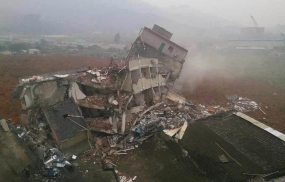 China landslide leaves 91 missing, sparks gas explosion