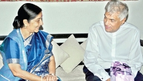 Sri Lanka willing to settle  fishermen issue peacefully, through talks - Ranil to Sushma