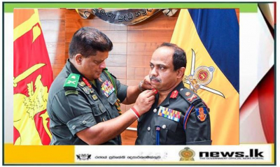 Promoted Judge Advocate Receives Insignia from Army Chief