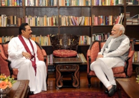 Indian PM Modi meets former President Rajapaksa