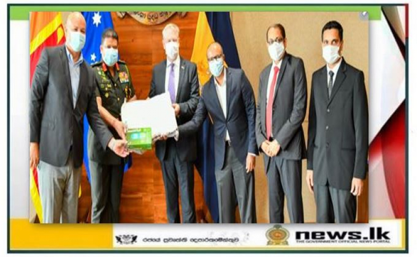 Head of NOCPCO Receives PPE &amp; Gloves from Australian Department of Defence