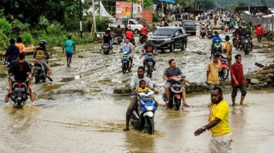 Flash floods kill at least 50 in Indonesia