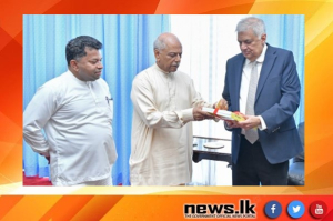 President presented with Sinhala and Tamil Font books on International Mother Language Day