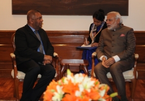 Foreign Minister Samaraweera calls on Prime Minister Modi in New Delhi