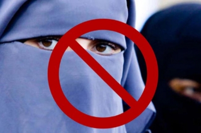 Covering of face  banned from today