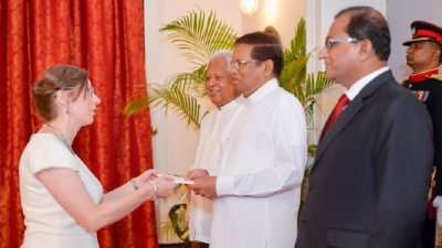 Four new envoys present credentials to President