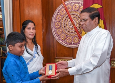 President confers Veerodhara Vibushana medals on two war heroes