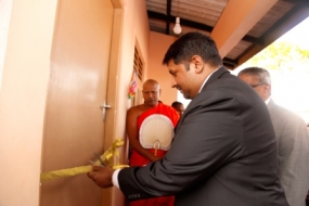 State Minister hands over houses for war heroes