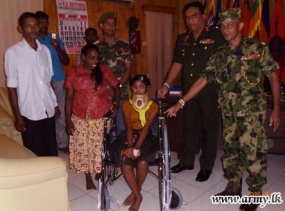 Army Officers Gift a Wheelchair to a Student  in Welikanda