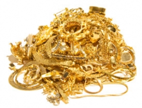Gold gains on demand from jewellers; silver declines