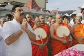 Alms giving at  Narahenpita Sri Abhayarama Vihara to bless the President