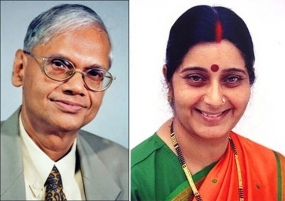 Prof Peiris invites Sushma Swaraj to visit Sri Lanka